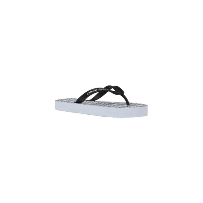 Black and white flip-flop displayed as part of the Black and White Flip Flop product