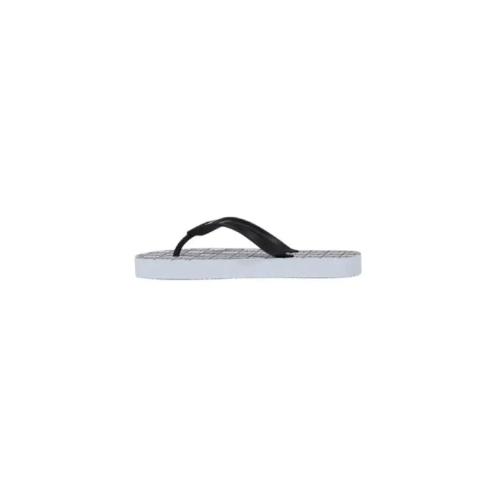 Black and white flip-flop footwear displayed in product named Black and White Flip Flop