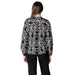 Black and white floral print blouse for women displayed in product listing