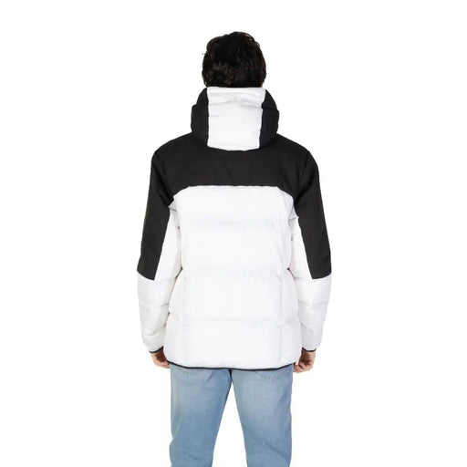 Black and white two-tone hooded puffer jacket displayed in product image