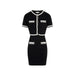 Black and white knit dress from Morgan De Toi featuring front pockets and short design