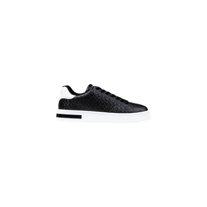 Black and white leather sneaker with black accents in a product named White Leather Sneaker