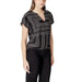 Black and white patterned blouse displayed in the product listing