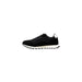 Black and white running sneaker from AX showcasing modern athletic footwear design