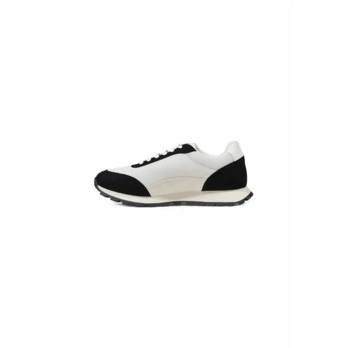 Black and white running sneakers showcasing stylish athletic footwear