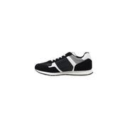 Black and white Tommy Hilfiger sneaker displayed in a high-quality product image