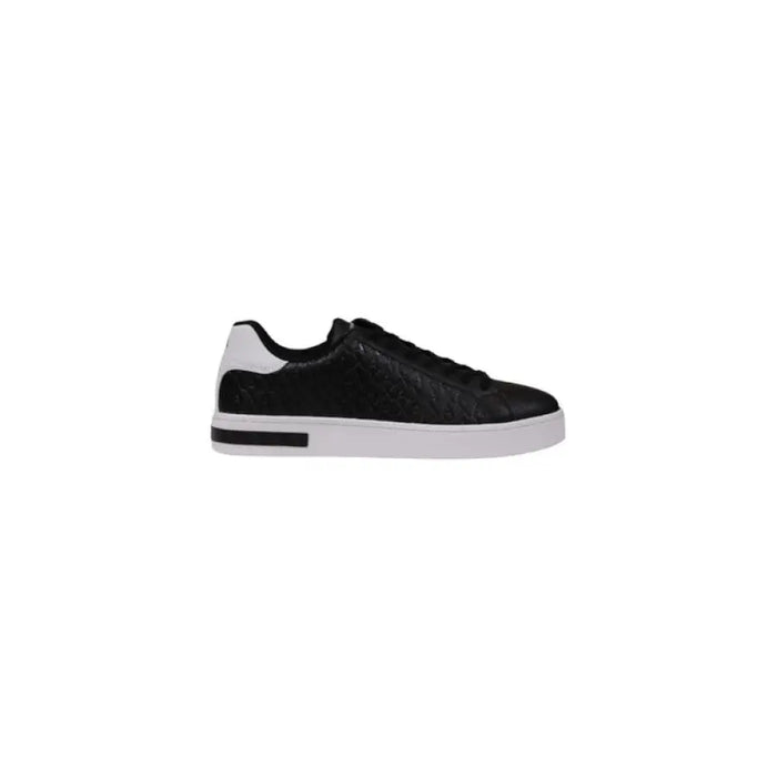 Black and white sneaker from the White Leather Sneaker with Black Accents collection