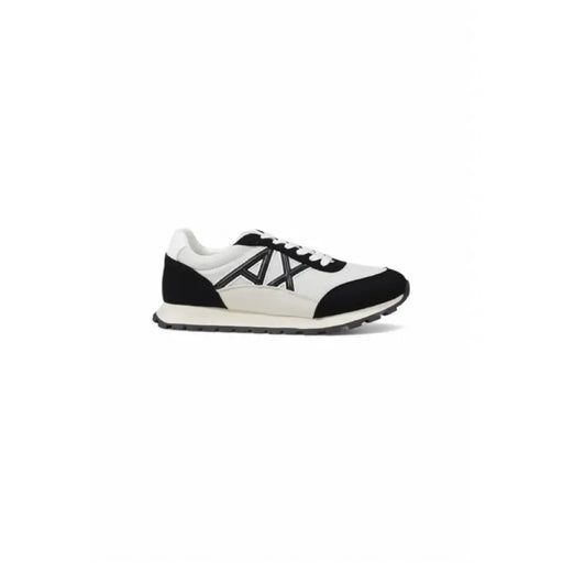 Black and white running sneakers displayed in a product showcase