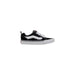 Black and white Vans sneaker displayed in a product listing with stylish design