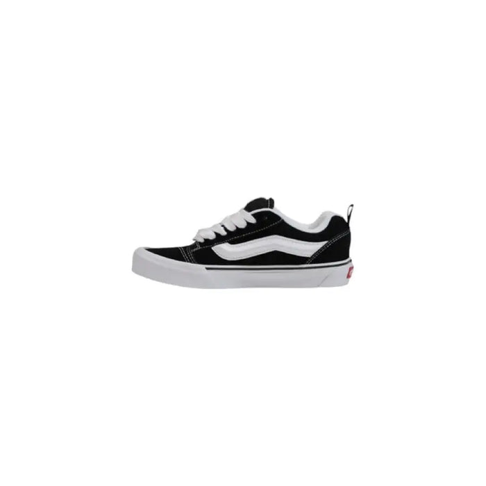 Black and white Vans sneaker displayed as part of the Vans Black and White Sneaker product line