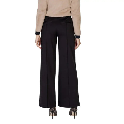 Black Flared Trousers featuring wide-leg design for stylish and comfortable wear