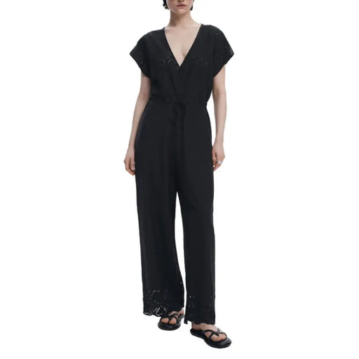 Black V Neck Embellished Wrap Jumpsuit displayed on a model showcasing elegant evening attire