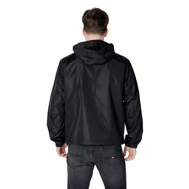 Black zip hooded long blazer by Armani Exchange in sleek lightweight fabric with subtle seam detailing and front pockets