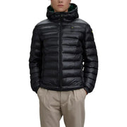 Black quilted down jacket with hood and zipper closure.