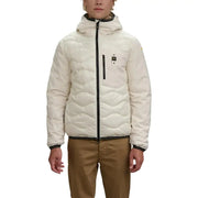 Cream quilted puffer jacket with black accents and hood.