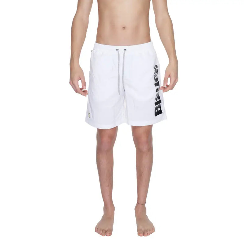 Blauer white print men’s swimwear featuring white swim trunks with black vertical lettering and a drawstring waistband