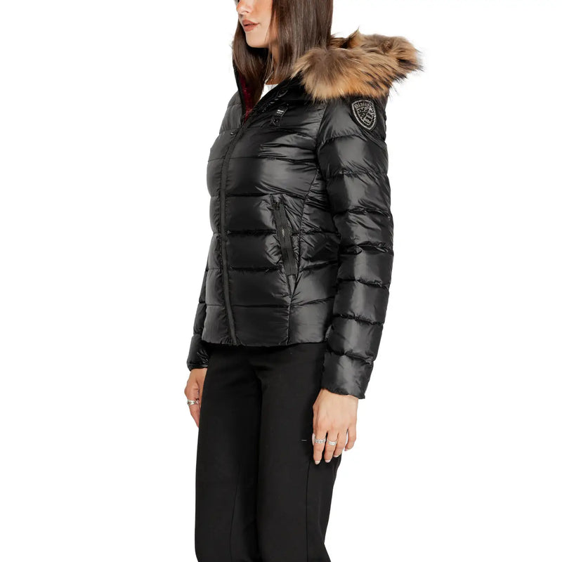 Blauer Doudoune matelassée noire en polyamide pour femme, avec capuche doublée de fourrure et écusson logo sur l'épaule.