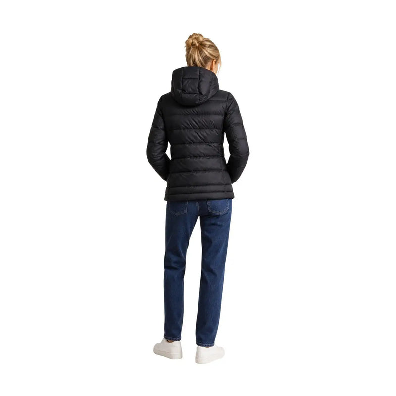 Blauer Doudoune matelassée noire en polyamide pour femme, avec capuche, présentant un design de vêtement d'extérieur d'hiver isolé