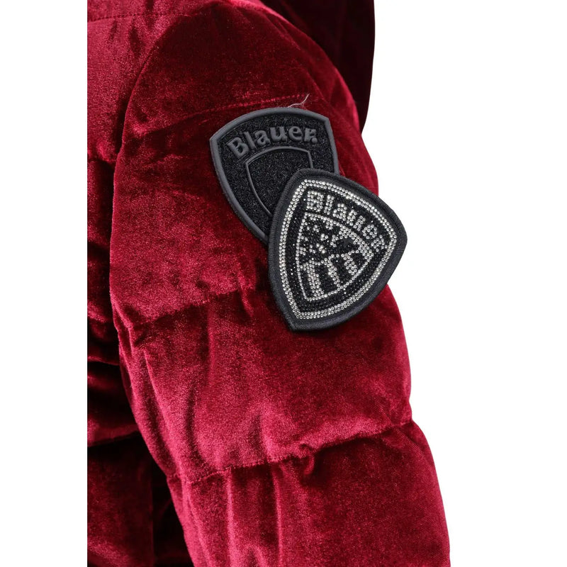 Deep red velvet puffer jacket with black shield patches embroidered with blauer in silver and rhinestones