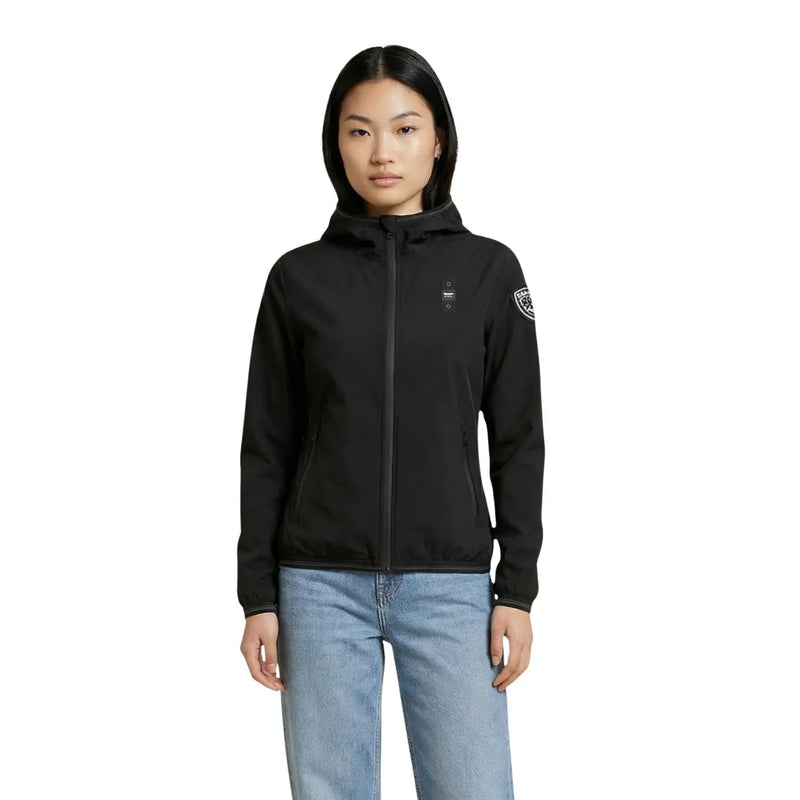 Blauer Veste à capuche blanche pour femme en nylon élasthanne noir, fermeture éclair intégrale et logo discret sur la poitrine et les manches.