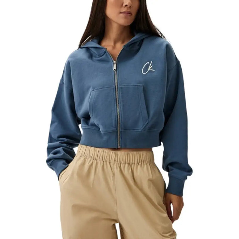 Blue cropped zip-up hoodie displayed on a model for the Blue Cropped Zip Up Hoodie product