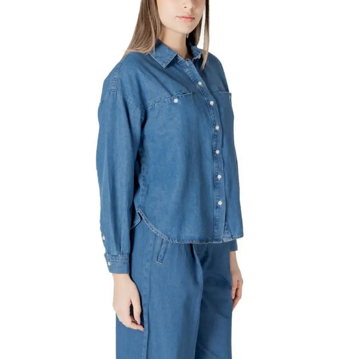 Blue denim button-down shirt featured in the Denim Button Down Shirt and Pants Set