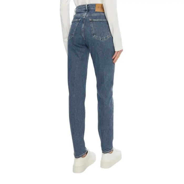 Blue high-waisted denim jeans for women displayed in a fashion product image