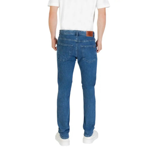 Blue denim jeans for men displayed in a product image