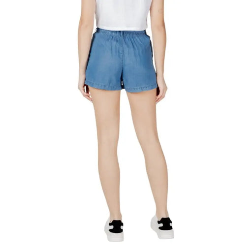 Blue denim paperbag shorts displayed in a stylish fashion product image