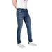 Blue denim slim-fit jeans by Tommy Hilfiger featuring front and back pockets