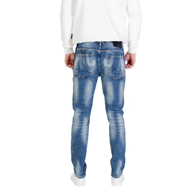 Blue distressed denim jeans with white stitching and pockets, possibly from a popular brand like guess or levis.