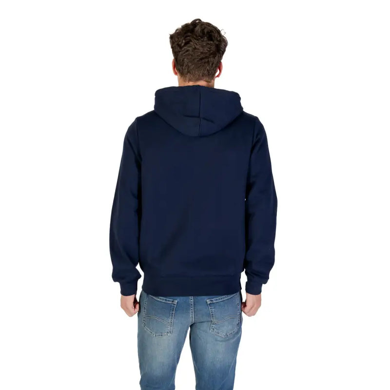 Men’s navy blue hoodie and blue jeans from Blue Lacoste Men Hooded Zip Sweatshirt collection