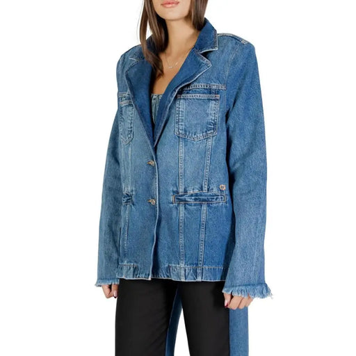 Blue long sleeve denim blazer for women with frayed cuffs and hem, classic collar, front button closure, and multiple pockets