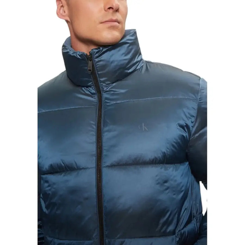 Blue Puffer Jacket featuring a stylish design and warm insulation for cold weather