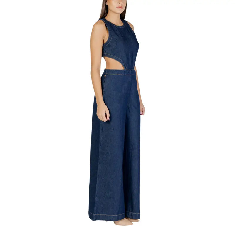 Dark blue denim sleeveless jumpsuit with zip, round neck, cut-out midsection, and wide-leg pants