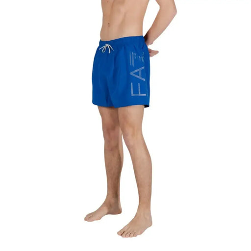 Blue swim trunks from EA7 Men Swimwear Spring Summer collection with plain laces