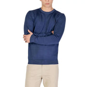 Navy blue crew neck long sleeve sweatshirt with ribbed cuffs and hem, made of cotton blend material.