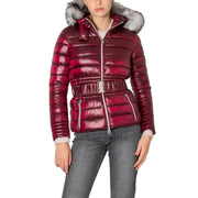 Bordeaux women’s shiny quilted burgundy puffer jacket with silver-toned belt and fur-lined hood