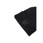 Black leather laptop sleeve with textured surface and small pocket on the front.