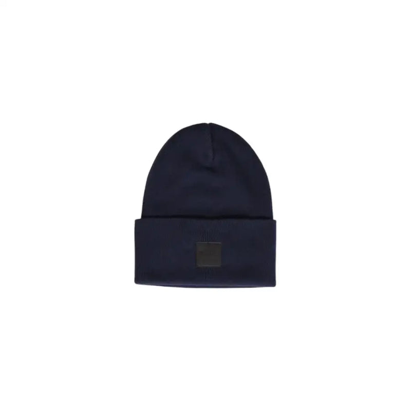 Navy blue beanie with a patch on the front.