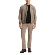 Beige bomber jacket with black zipper and ribbed cuffs, made of leather.