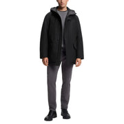 Veste Boss pour homme, parka longue noire à capuche en polyester, au design moderne et élégant, avec doublure intérieure grise discrète.
