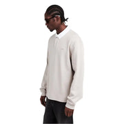 Polo Boss pour homme, manches longues, gris anthracite, en mélange de coton beige avec col blanc et broderie discrète sur la poitrine.