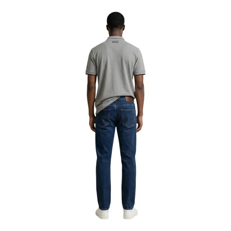 Polo homme Boss gris en mélange de coton, manches courtes, taille L, avec un col discret (vue de face).