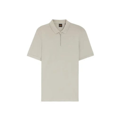 Polo beige pour homme, en coton, à manches courtes et fermeture éclair discrète, logo minimaliste.