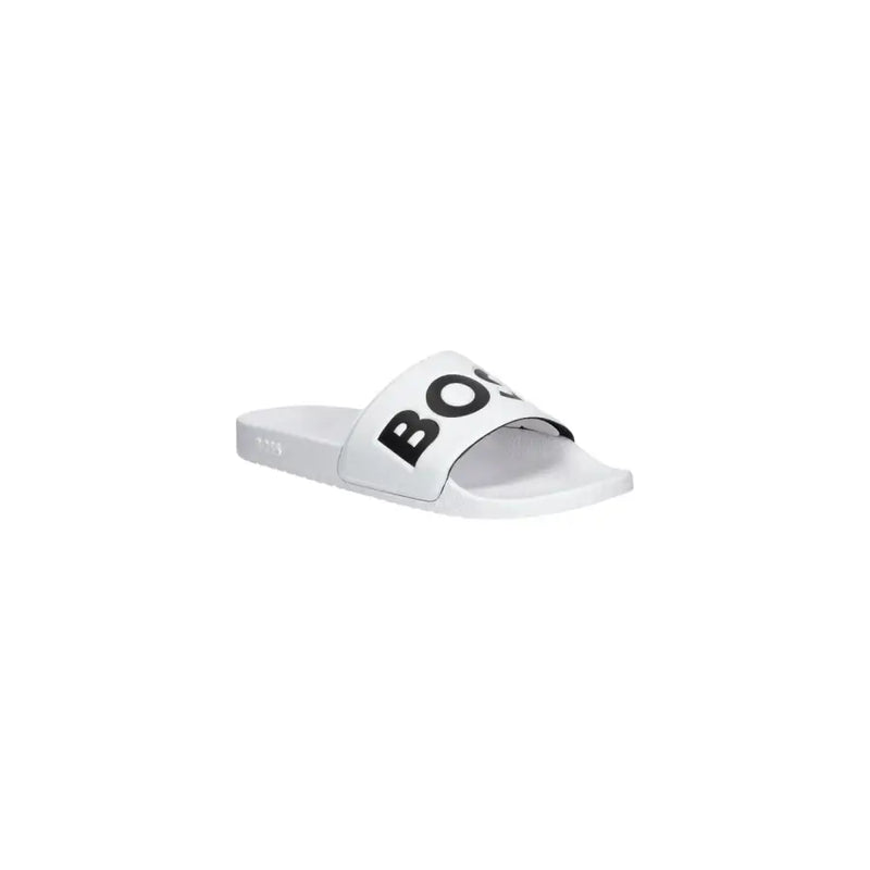 Sandales à enfiler Boss pour homme, blanches, en PVC imprimé du logo, avec inscription noire en gras sur la bride, idéales pour le printemps et l'été.