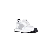 White and gray reebok sneaker with textured upper, black sole