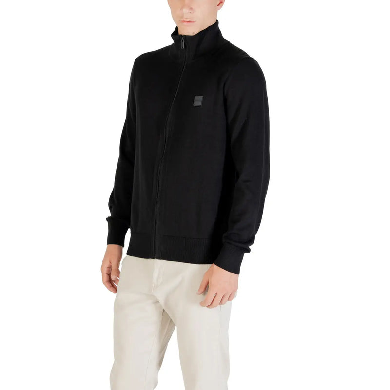 Pull à col roulé en laine Boss pour homme, noir, avec col et poignets côtelés, vue de face
