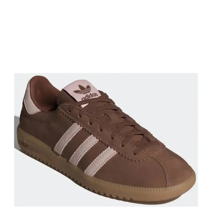 Brown Adidas sneaker with pink accents and pink stripes for stylish athletic wear