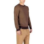 Brown textured sweater with ribbed cuffs and hem, likely made of cotton or wool blend.